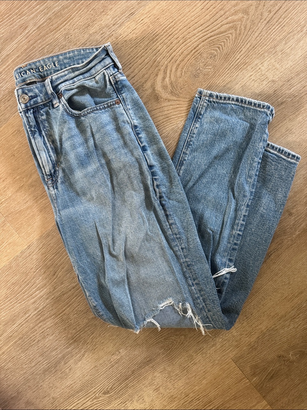 American Eagle Outfitters Strigid Light Blue Boyfriend Jeans with Distressed Hem